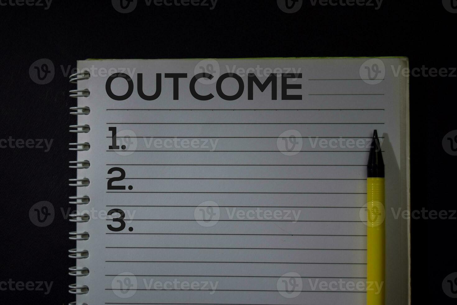Outcome and Number write on a book isolated on Office Desk. photo