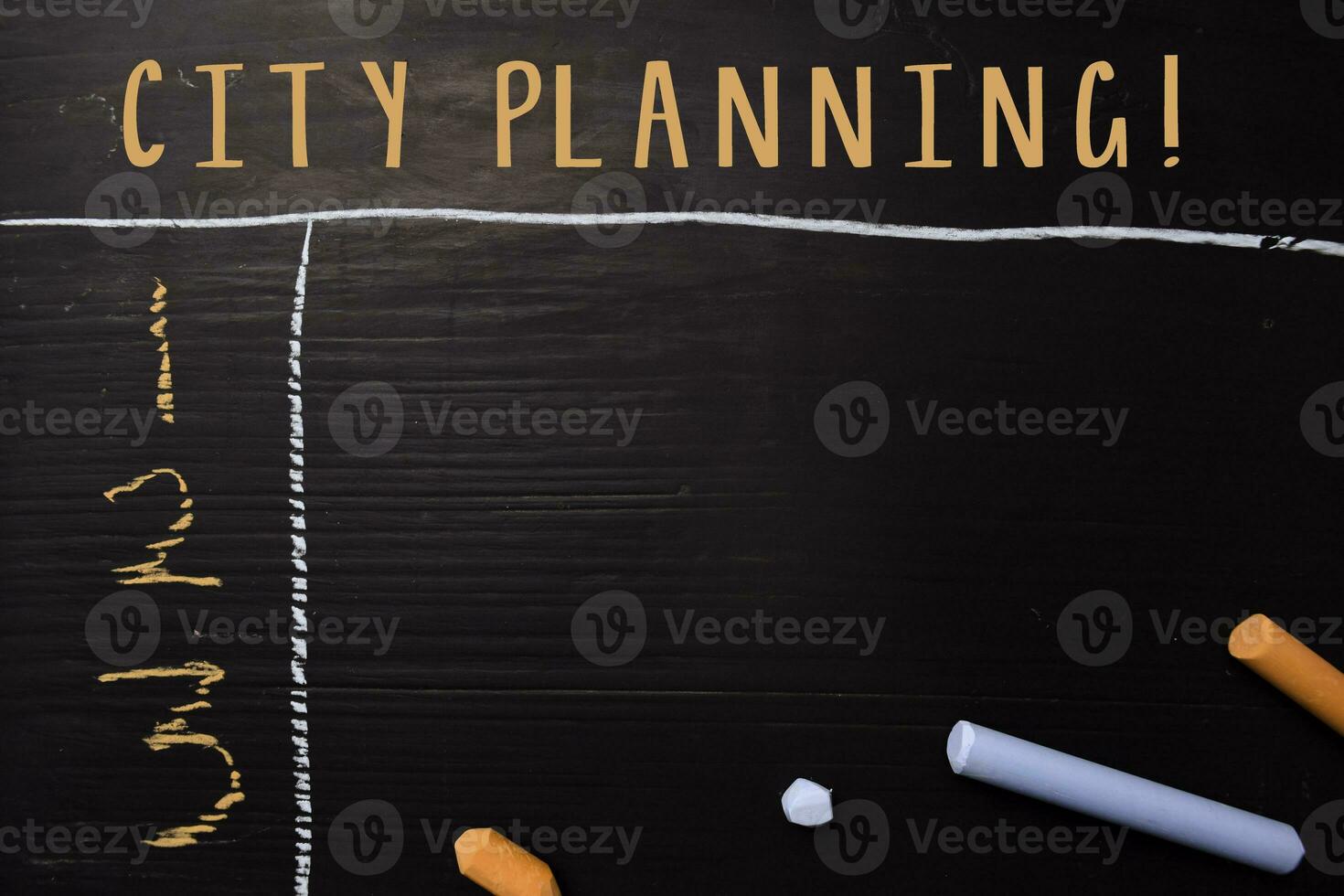 City Planning written with color chalk. Supported by an additional services. Blackboard concept photo