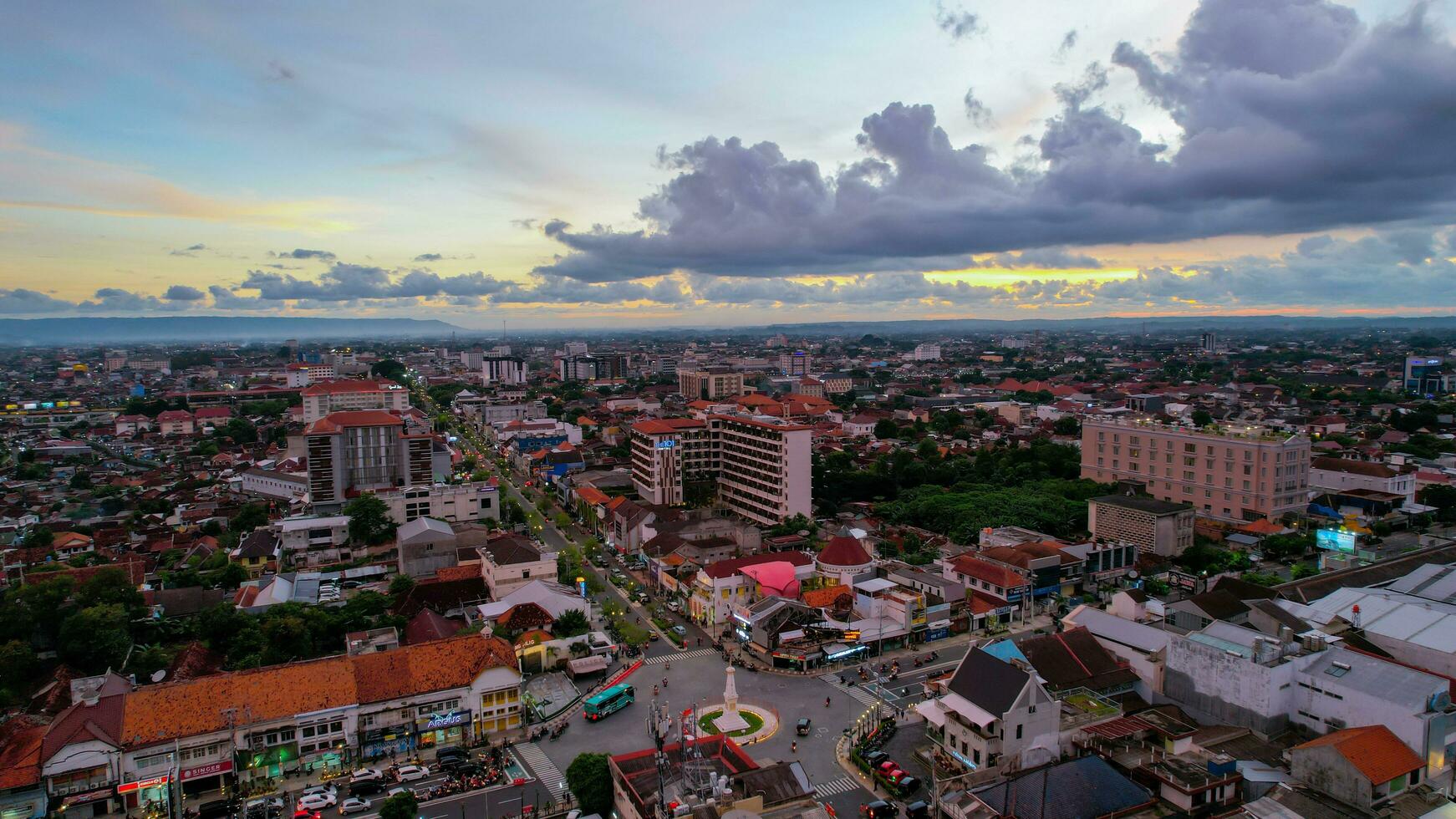 Aerial view of the tugu jogja or known as tugu pal is the iconic landmark of Yogyakarta. Central Java, Indonesia, December 6, 2021 photo