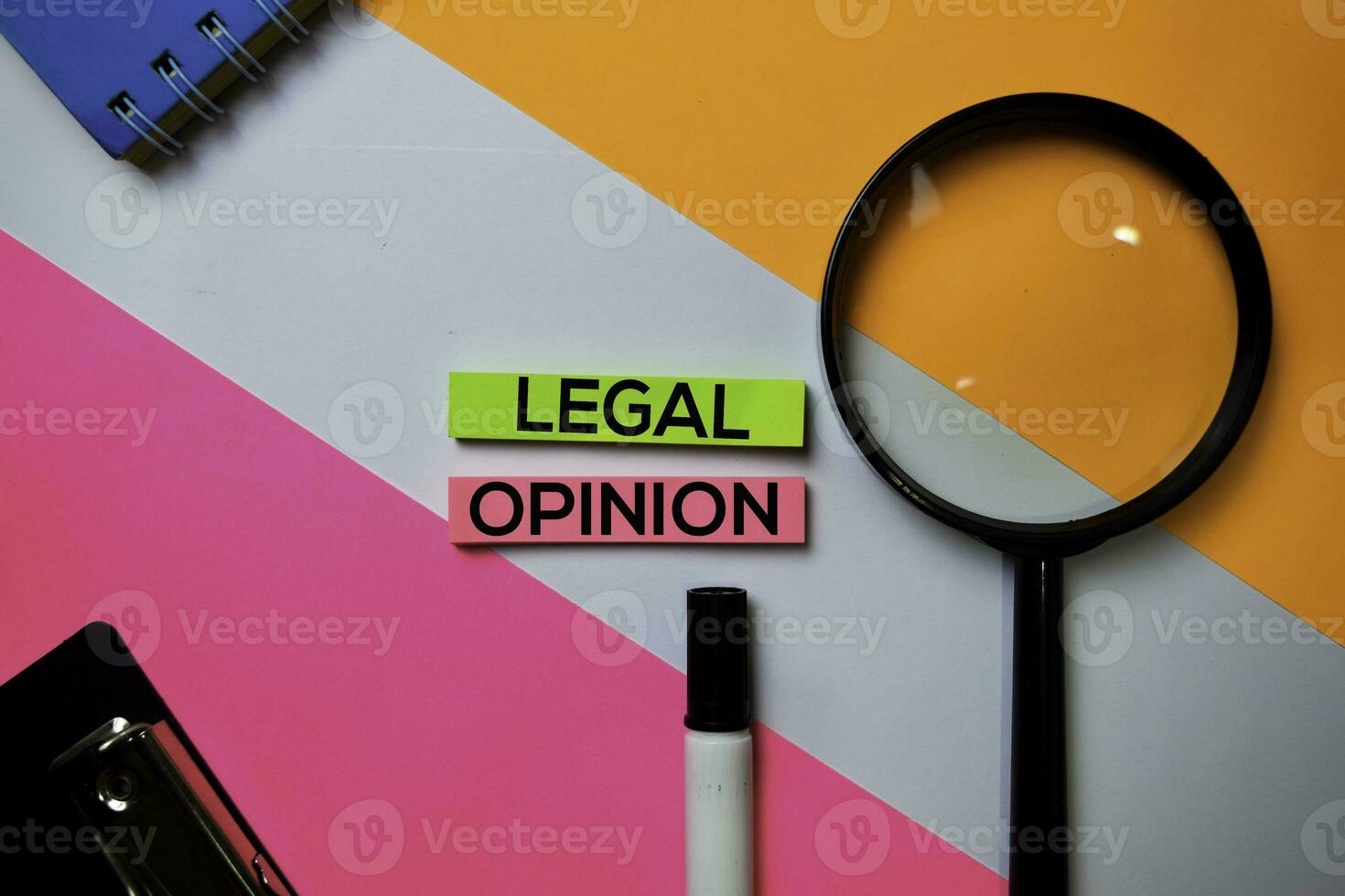 Legal Opinion text on sticky notes with color office desk concept photo