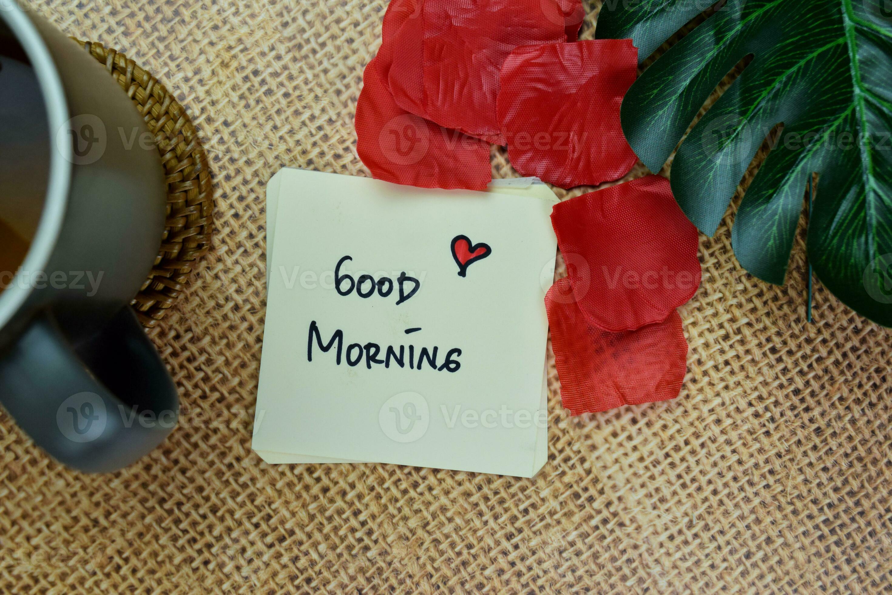 Good Morning write on sticky notes isolated on Wooden Table. 23675270 ...