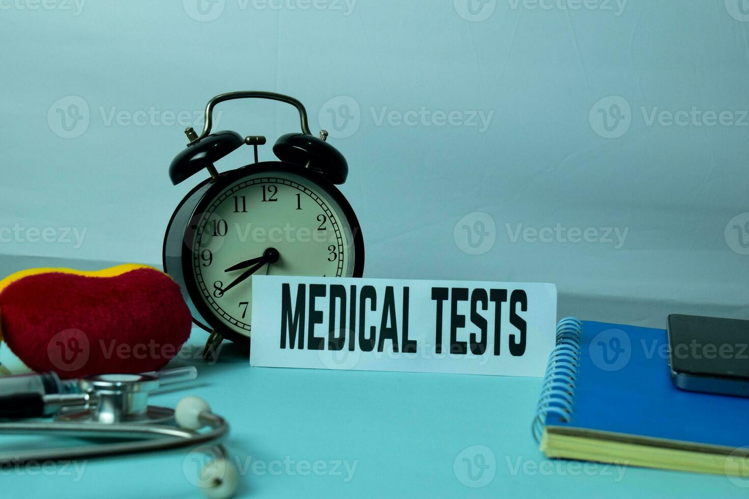 Medical Tests Planning on Background of Working Table with Office Supplies. Medical and Healthcare Concept Planning on White Background photo