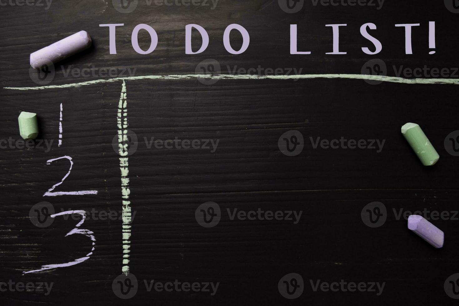 To Do List written with color chalk. Supported by an additional services. Blackboard concept photo