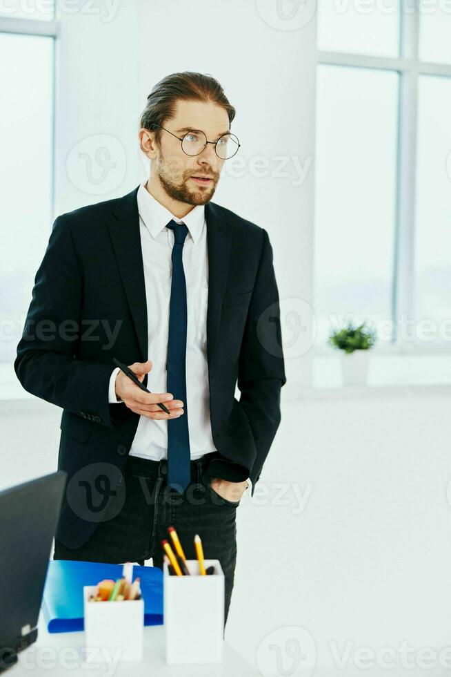 businessman in the office with documents technologies photo