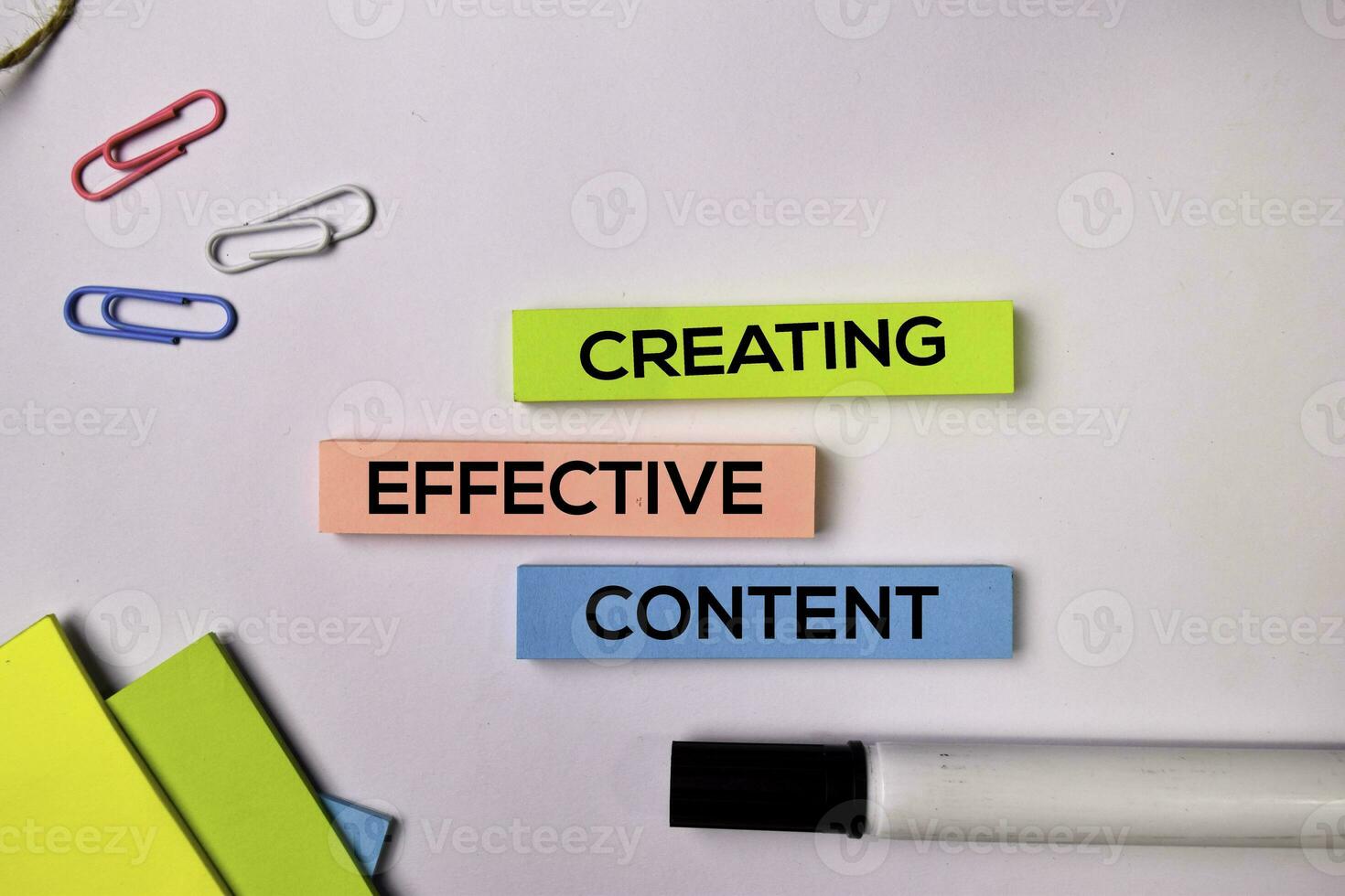 Creating Effective Content on sticky notes isolated on white background. photo