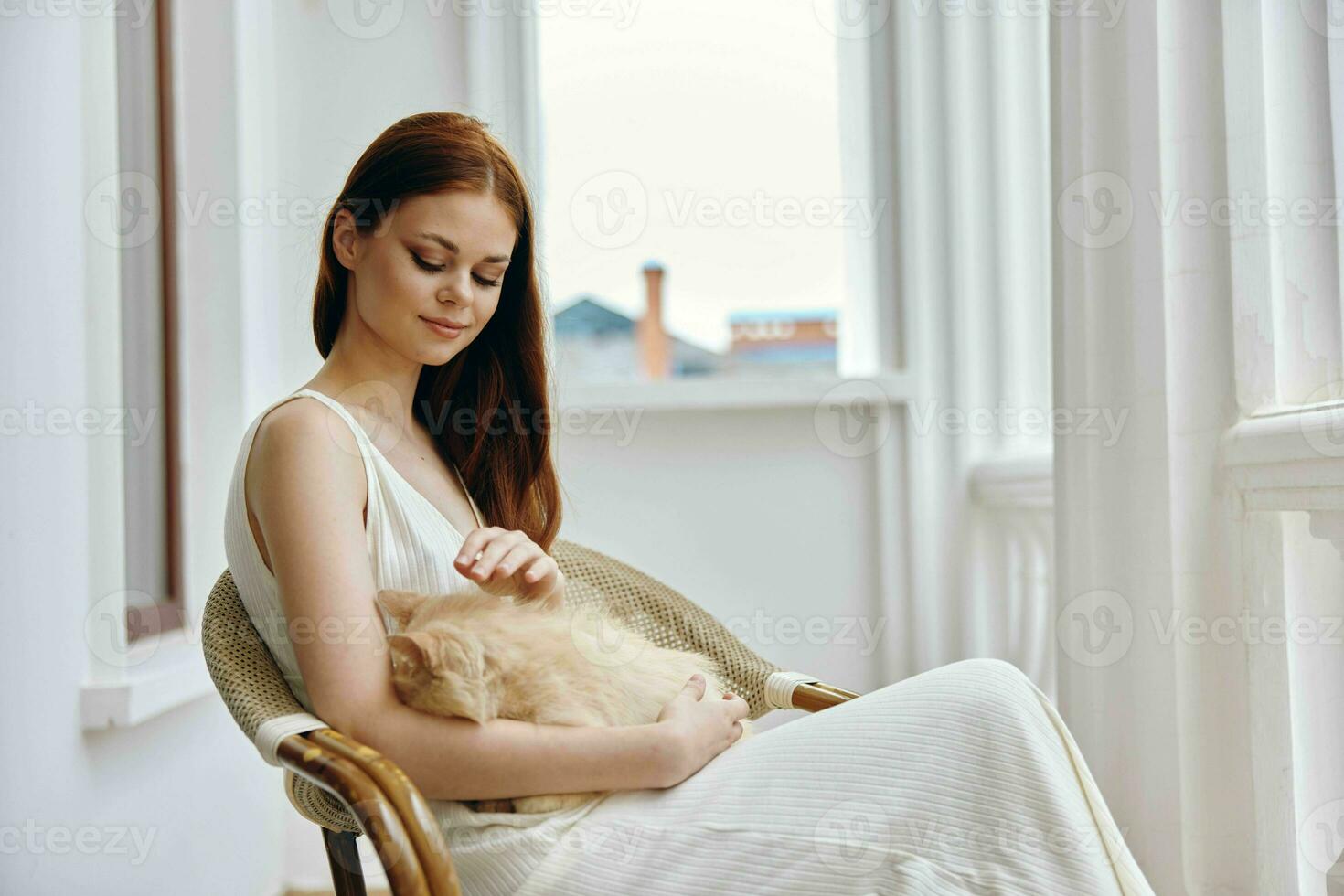 pretty woman hostess with her pet on the terrace outdoor recreation unaltered photo