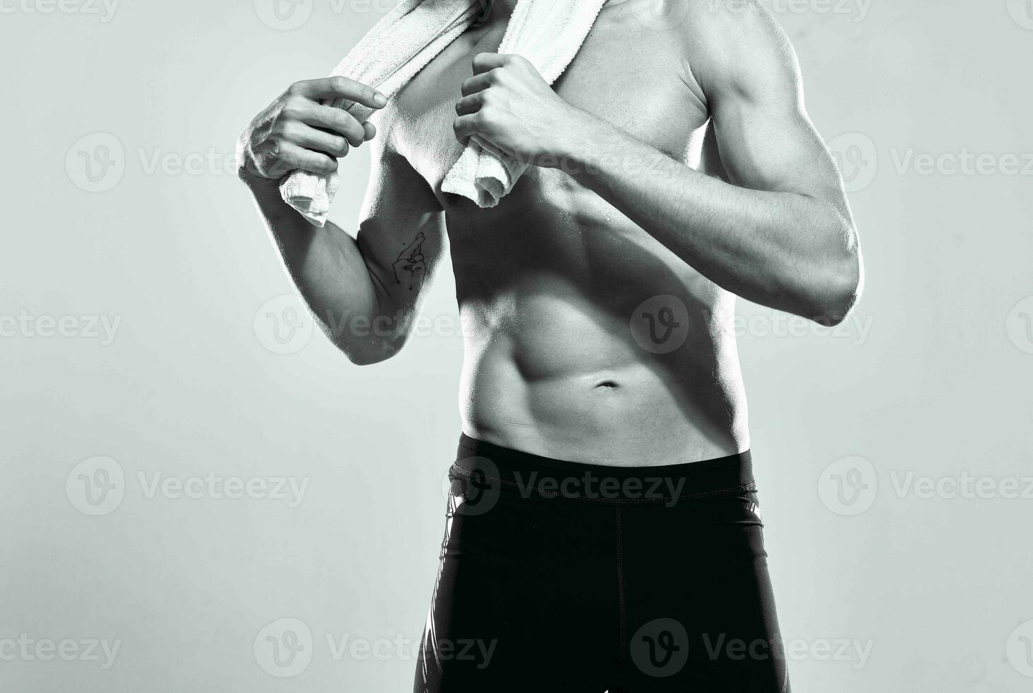 athletic man with pumped up abs motivation exercise workout photo