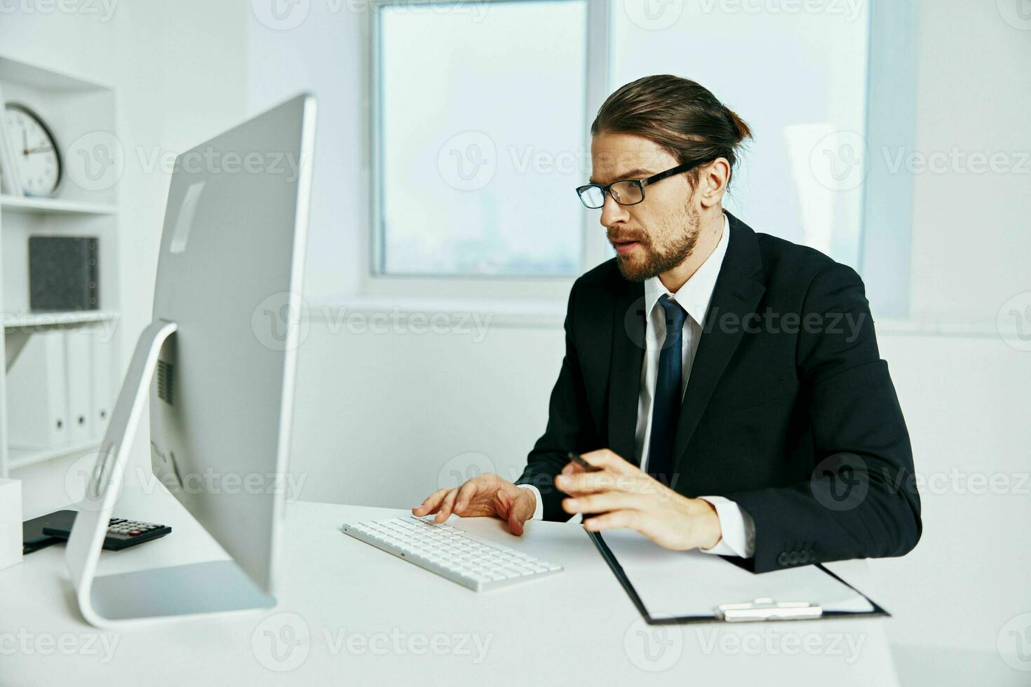 office worker in a suit office work phone executive photo
