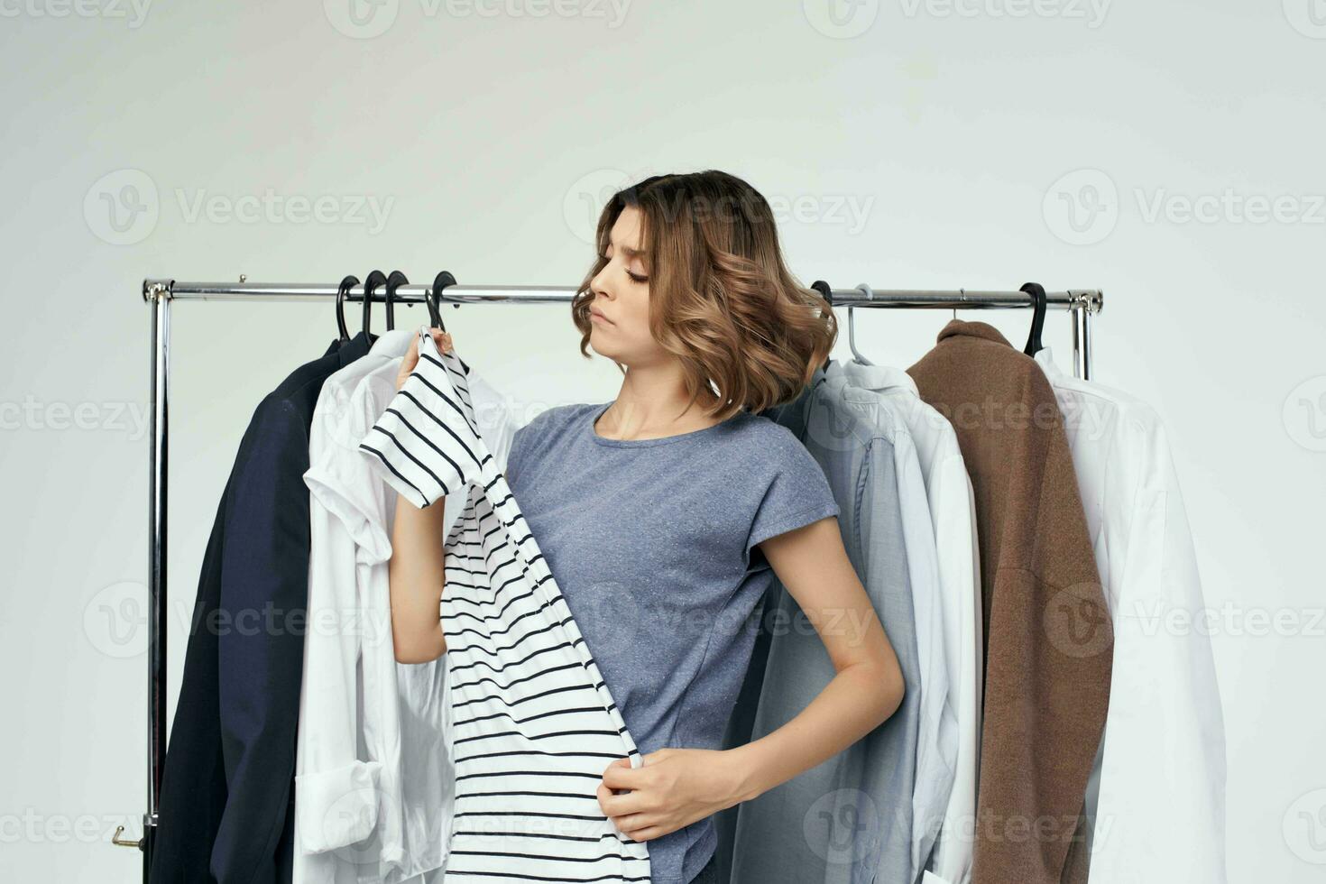 beautiful woman clothes hanger shopping isolated background photo