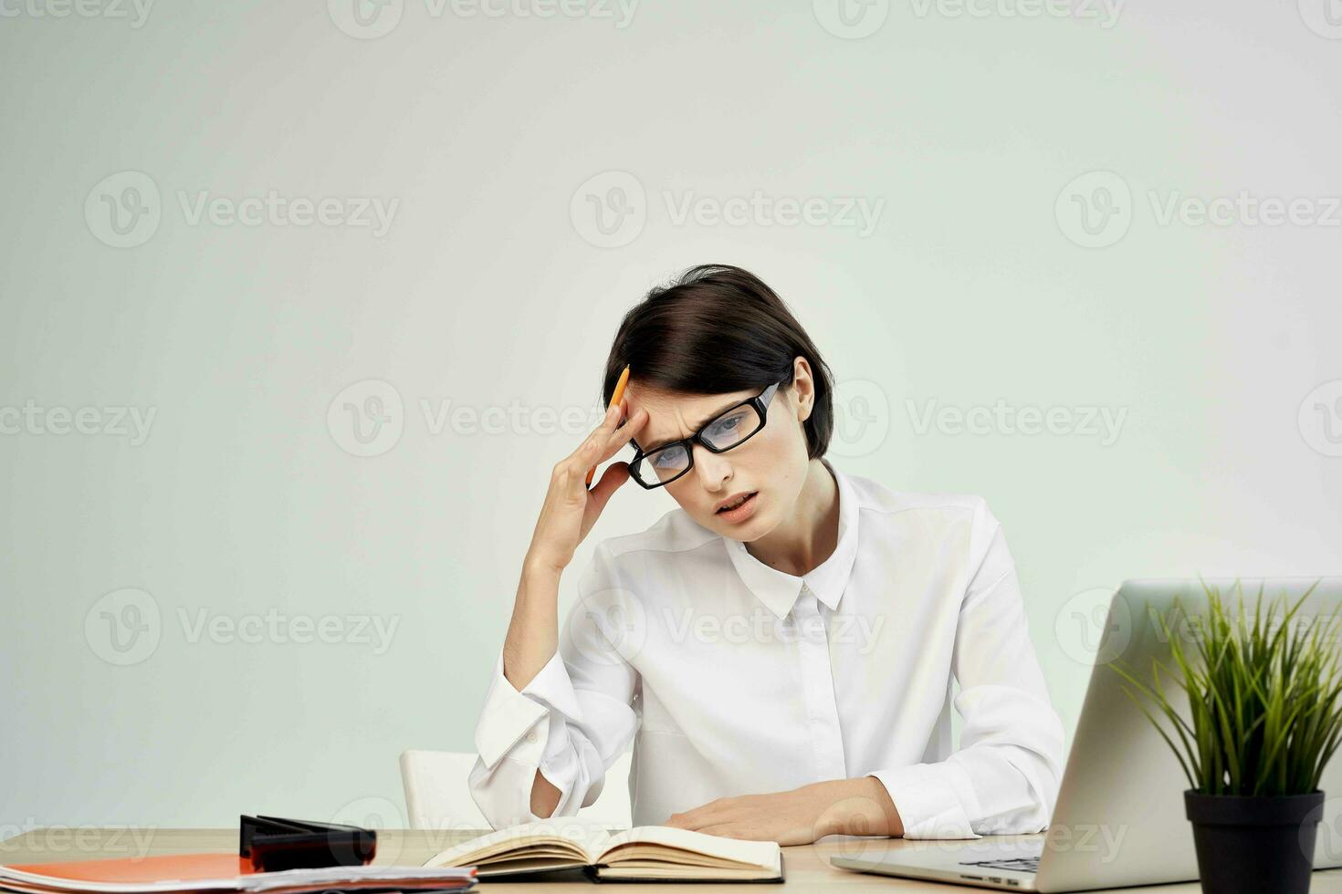 female manager in the office with glasses self-confidence Studio Lifestyle photo