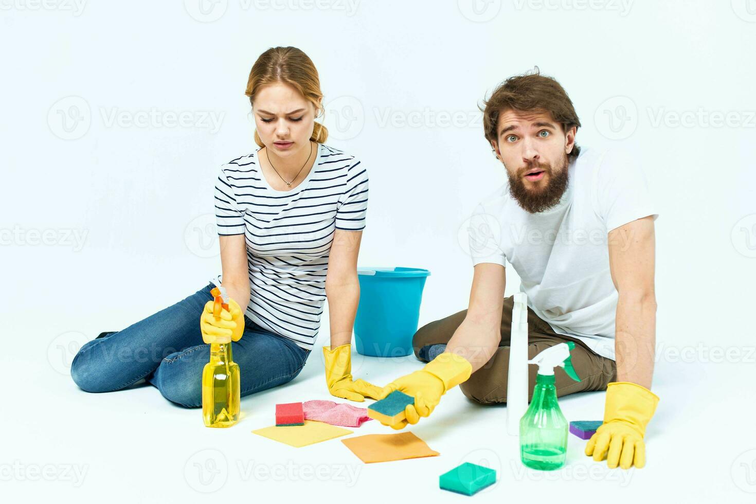 young couple washing floor service teamwork lifestyle chores photo