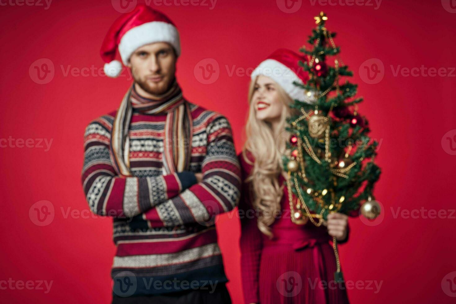 cute married couple in new year clothes holiday christmas studio photo