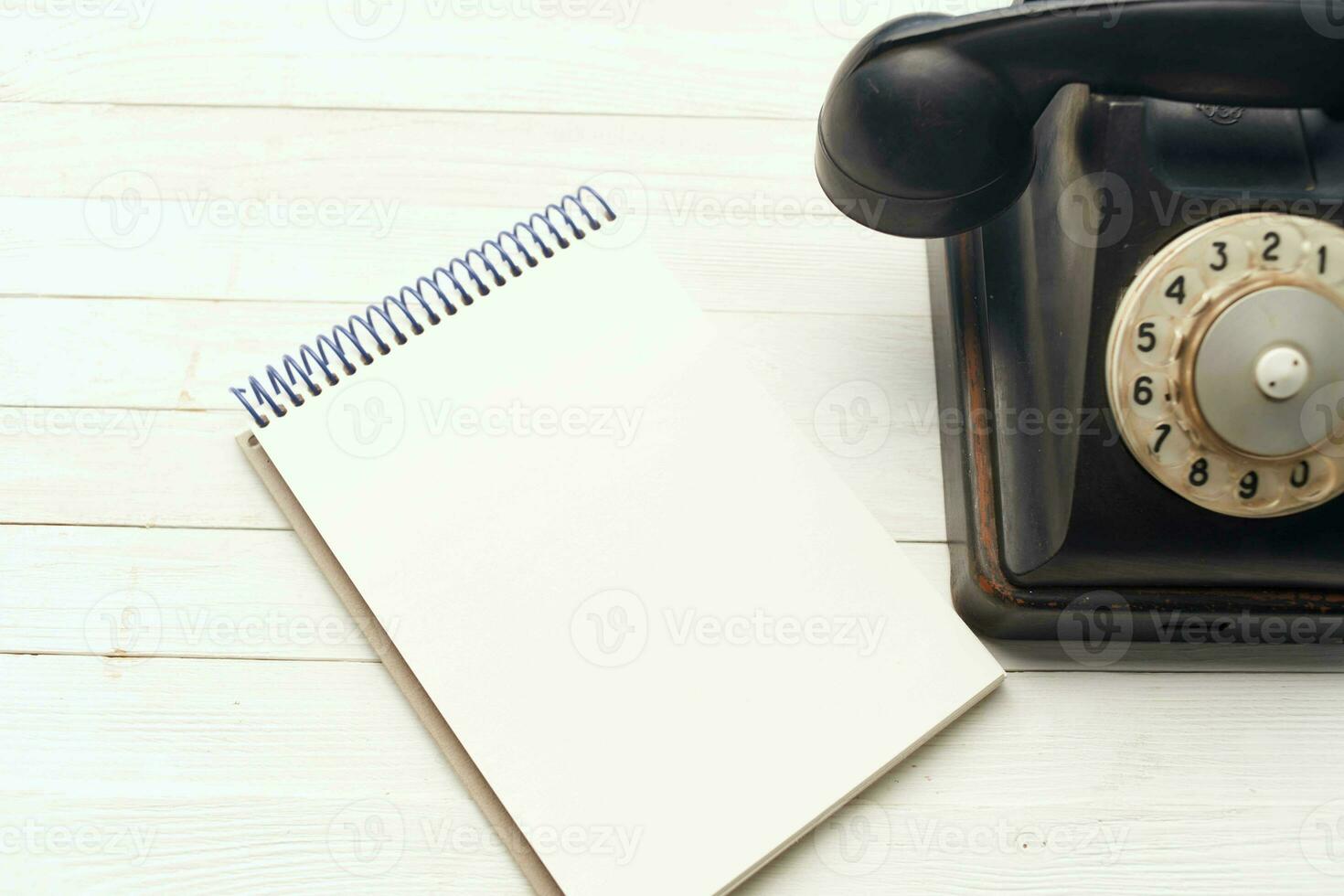 retro telephone he communication office notepad wooden background object photo