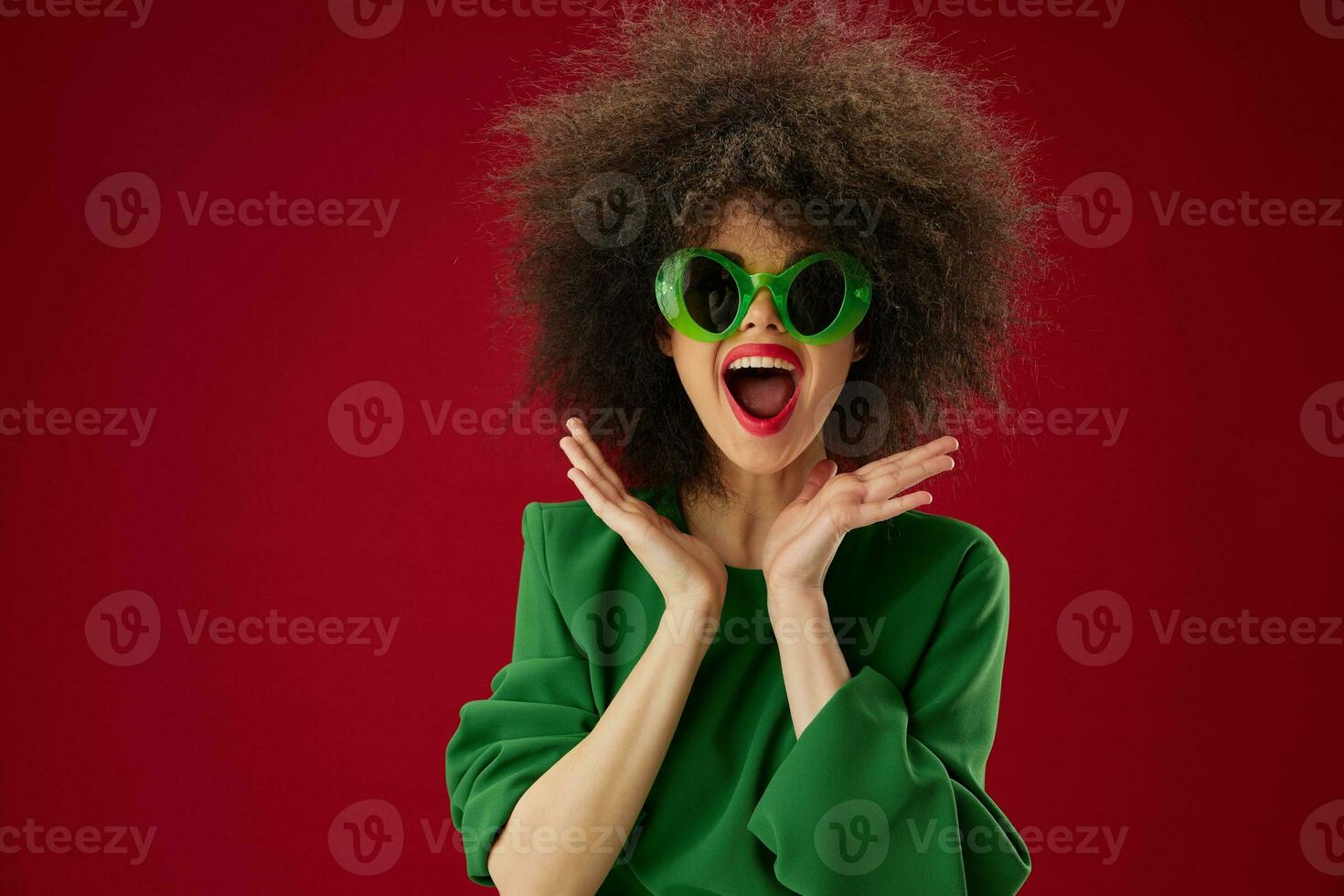 pretty woman posing emotion gesture hands red background photo