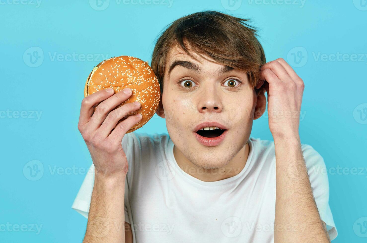 man in white t-shirt hamburger diet food snack lifestyle photo