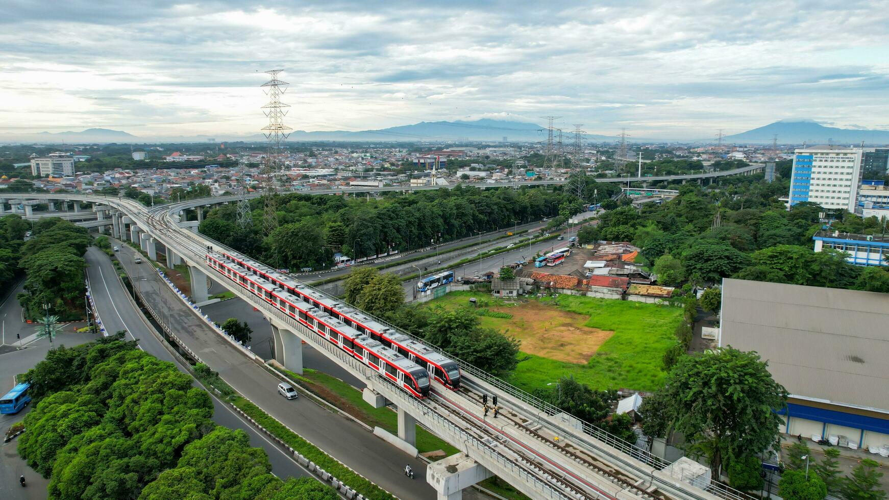 Aerial view of Jakarta LRT train trial run for phase 1 from UKI Cawang. Jakarta, Indonesia, March 8, 2022 photo