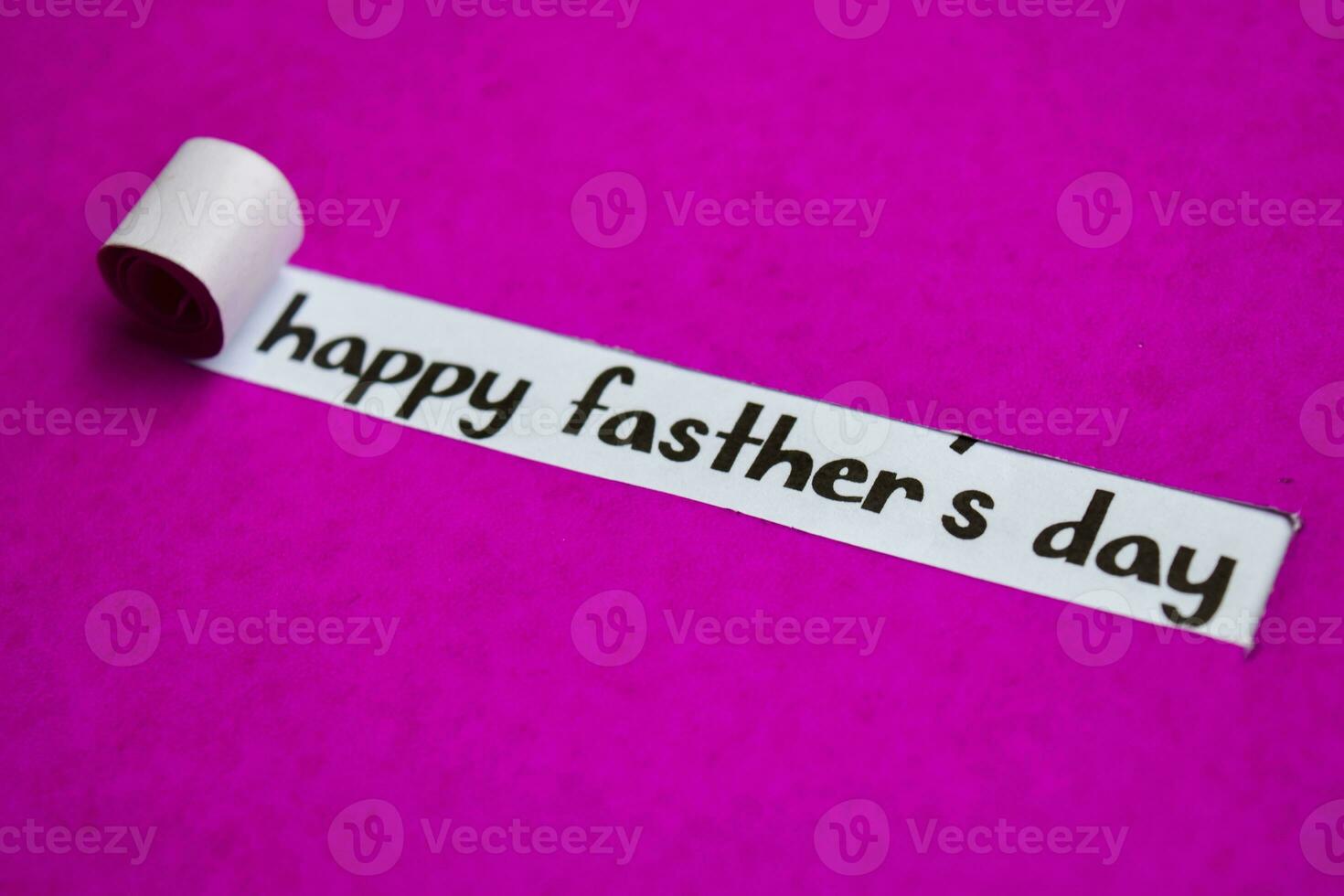 Happy Father's Day text, Inspiration, Motivation and business concept on purple torn paper photo