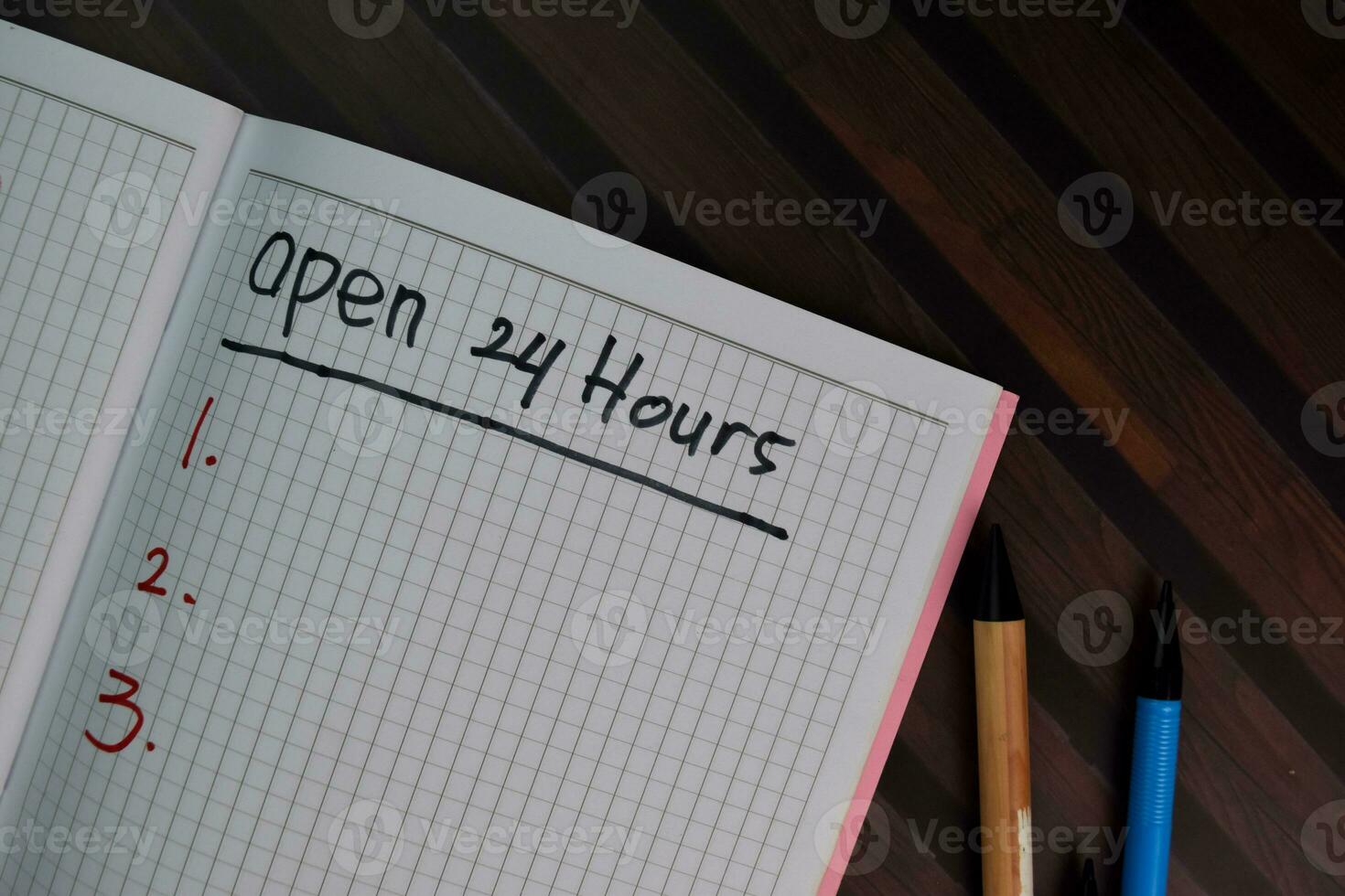 Open 24 Hours write on a book and supported by additional services isolated on Wooden Table. photo