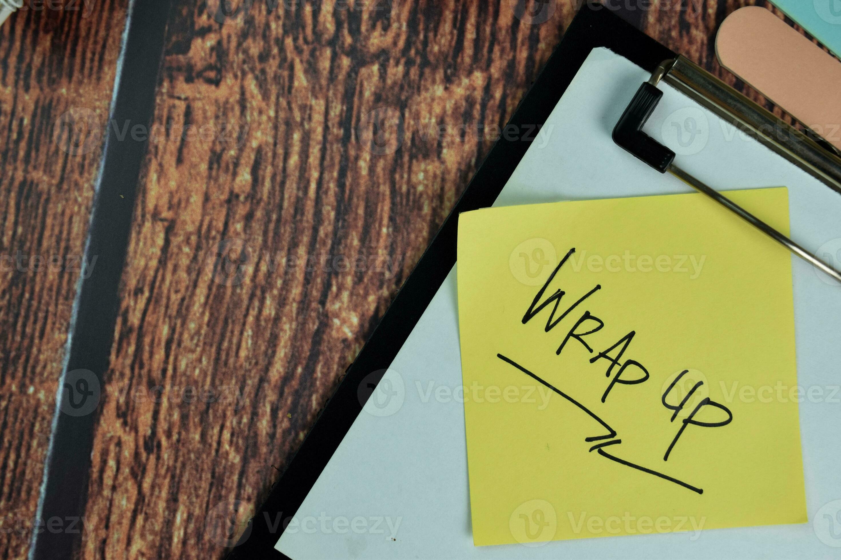 Warp Up write on sticky notes isolated on Wooden Table. 23694402 Stock