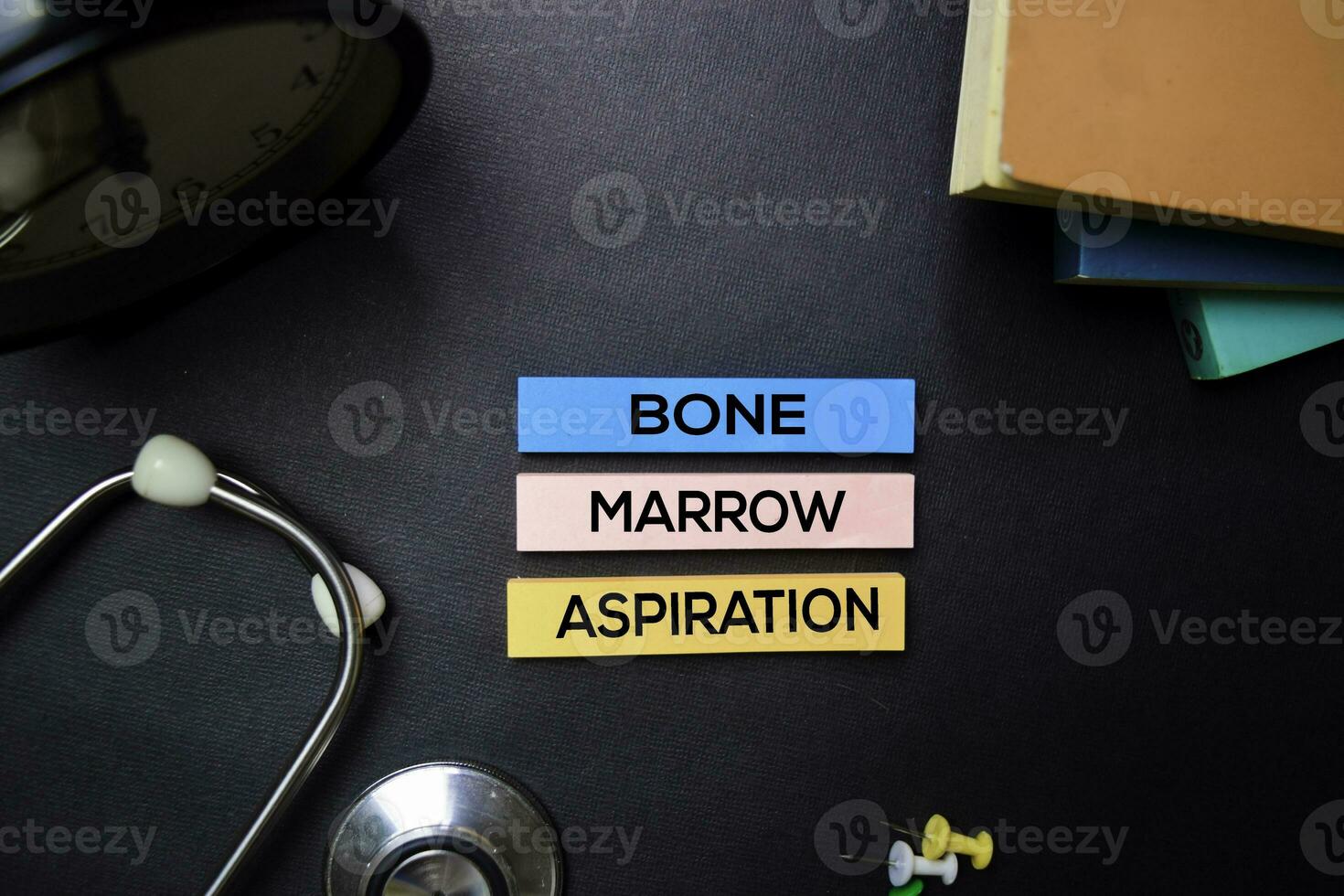 Bone Marrow Aspiration text on Sticky Notes. Top view isolated on black background. Healthcare Medical concept photo