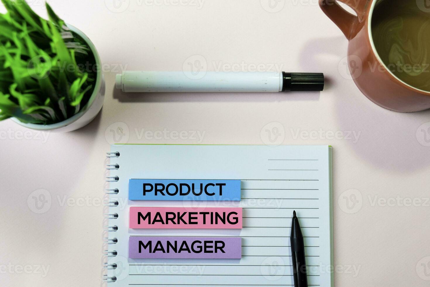 Product Marketing Manager text on sticky notes with office desk concept photo