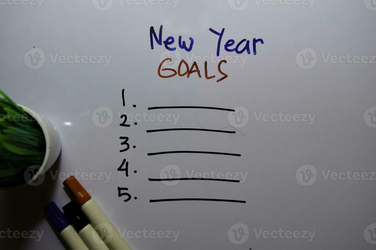 New Year Goals with check list write on white board background photo