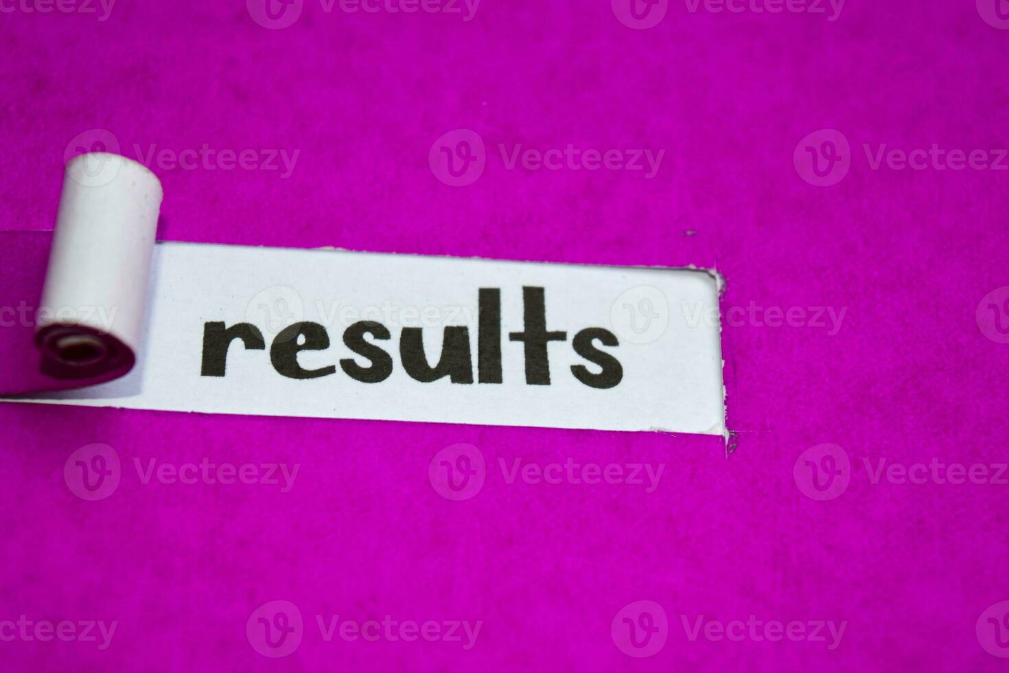 Results text, Inspiration, Motivation and business concept on purple torn paper photo