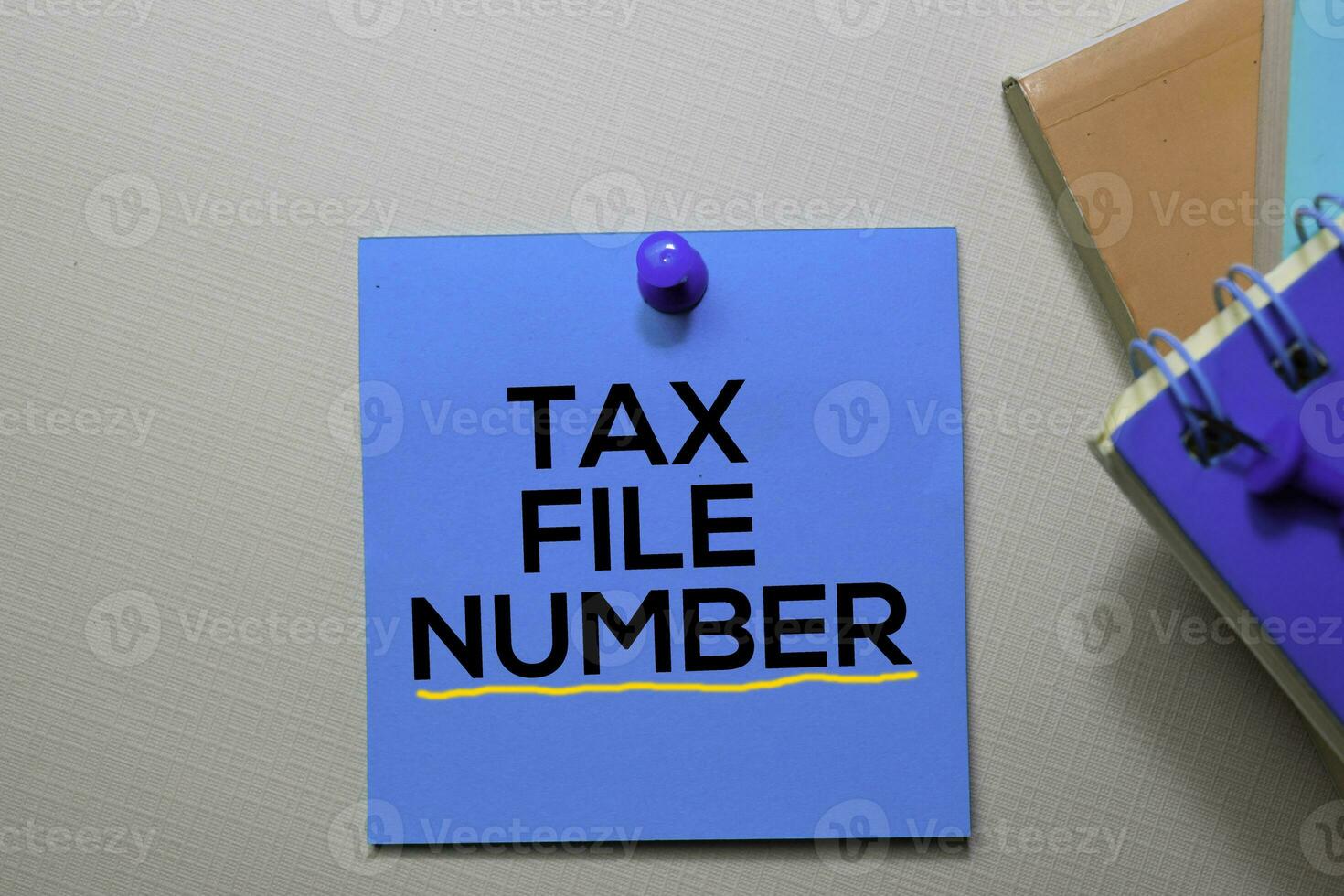 Tax File Number text on sticky notes isolated on office desk 23696085