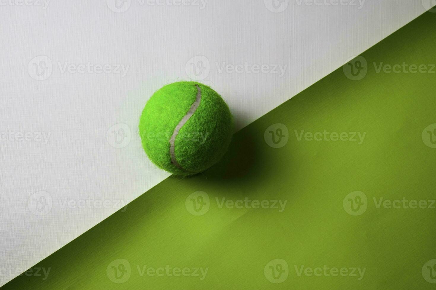 Tennis ball on top view office desk table of Business workplace and business objects. photo