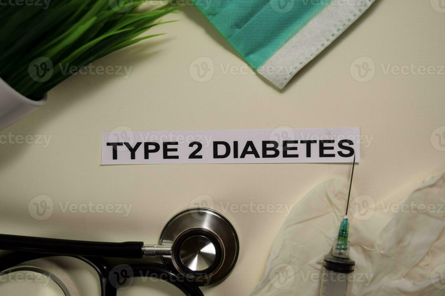 Type 2 Diabetes with inspiration and healthcare medical concept on desk background photo