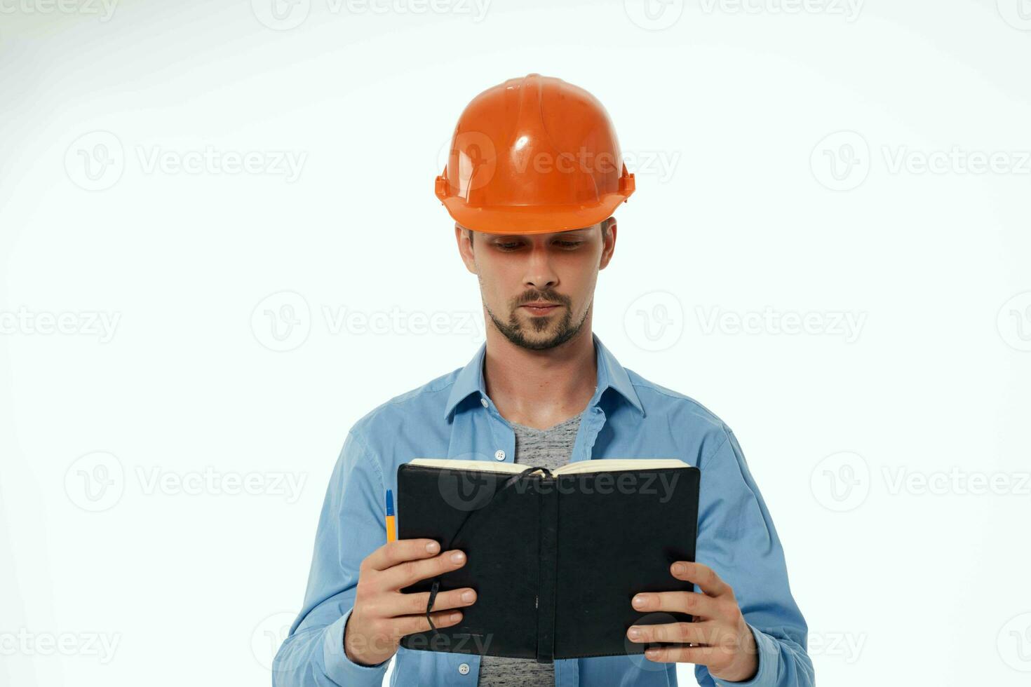 man engineer blueprints builder Working profession photo