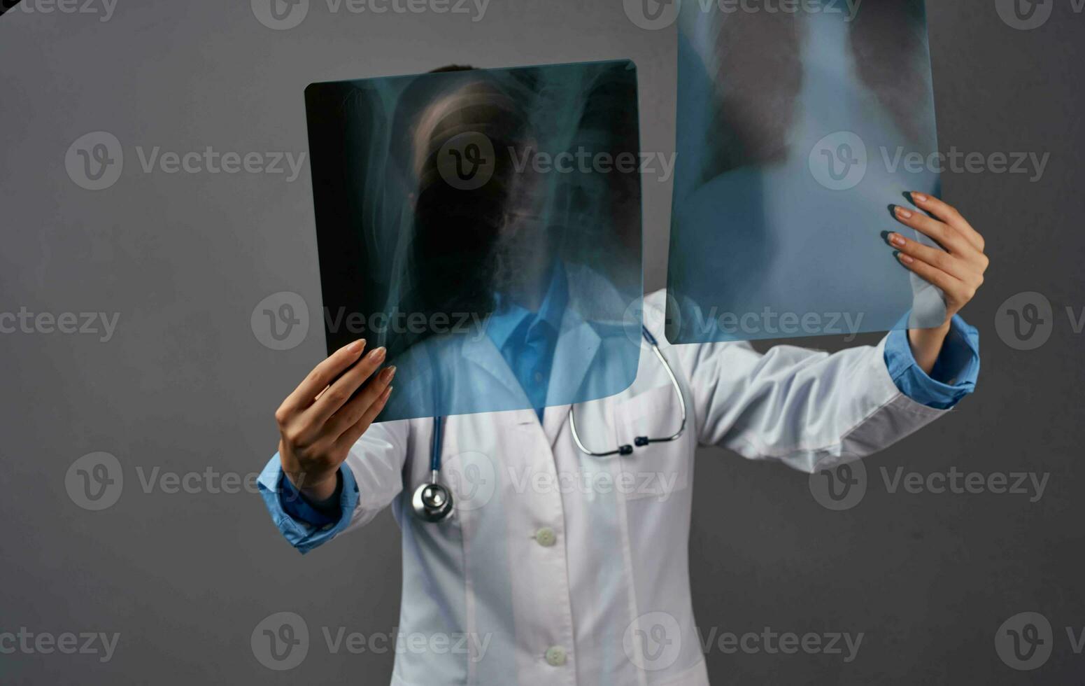 female doctor medicine diagnosis by x-ray examination photo