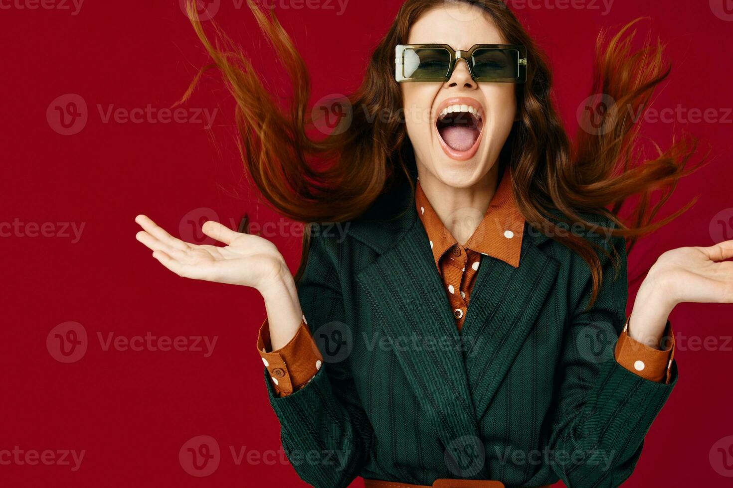 woman with disheveled hair throws up her hands fashion studio 23701104