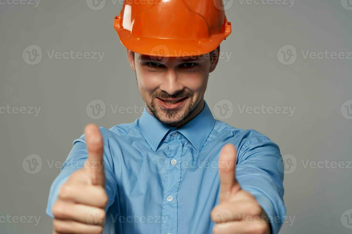 man in orange helmet blueprints builder isolated background photo