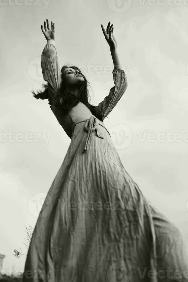 pretty woman in dress dramatic style emotions posing elegant style photo