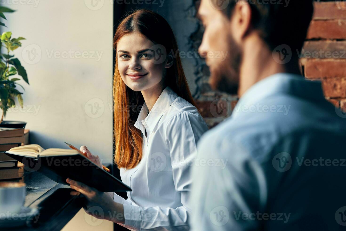 work colleagues sitting in a cafe breakfast communication lifestyle finance photo