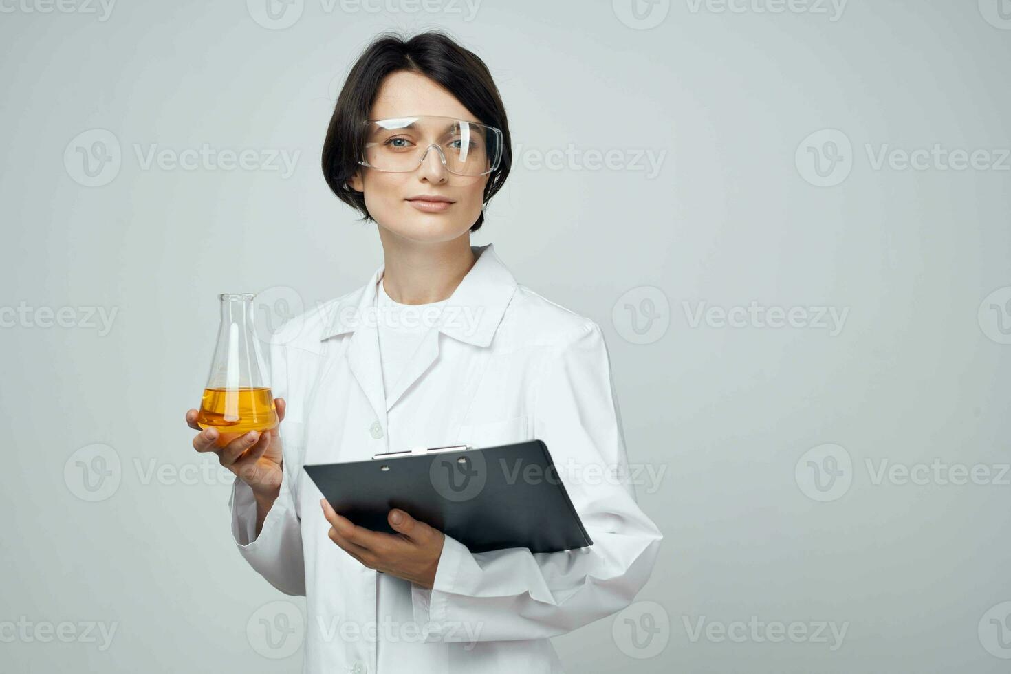 woman laboratory assistant science chemical solution research technology photo