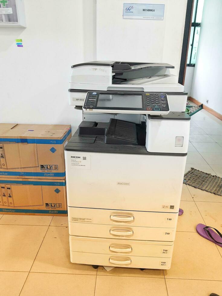 Jakarta, Indonesia in October 2022. A copier with the brand and type RICOH MP4054. photo
