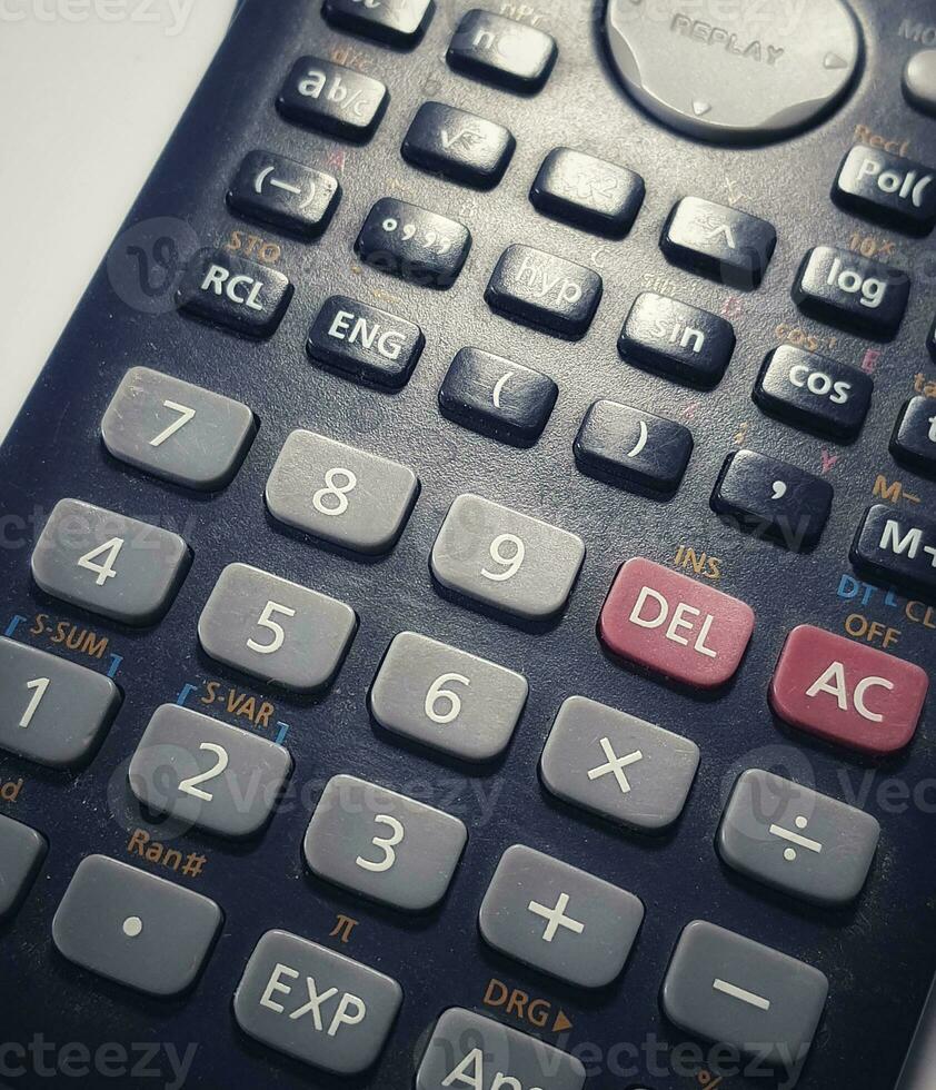 Close up photo of the buttons in the scientific calculator. 23720236