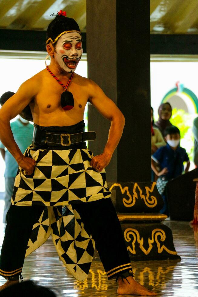 Yogyakarta, Indonesia on October 2022. Puppet people at the Yogyakarta Palace, the performance shown is about the play of the characters Petruk, Semar, and Gareng. photo