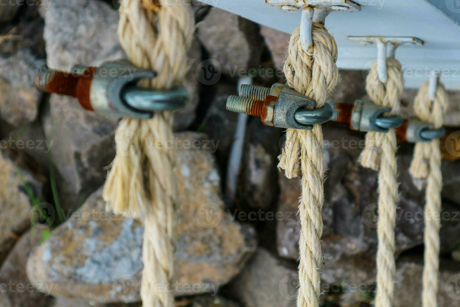 rope for boats is a collection of linear plies, threads or strands that are twisted or braided together photo