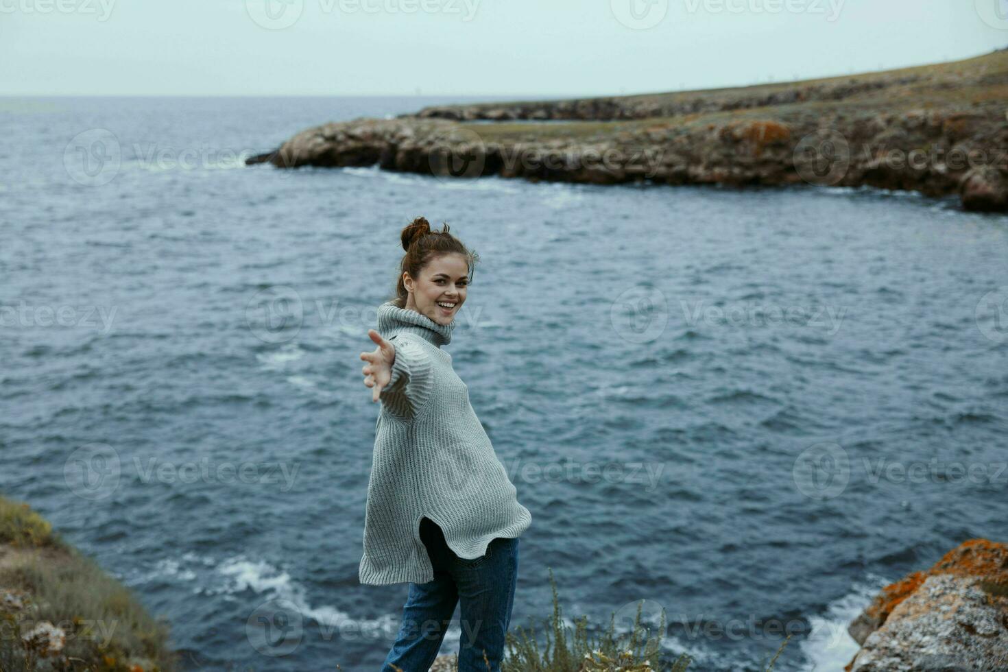 beautiful woman beach tourism cloudy weather stone coast Lifestyle photo