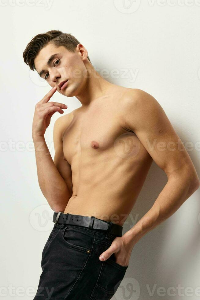 Handsome man posing elegant style muscular torso photo