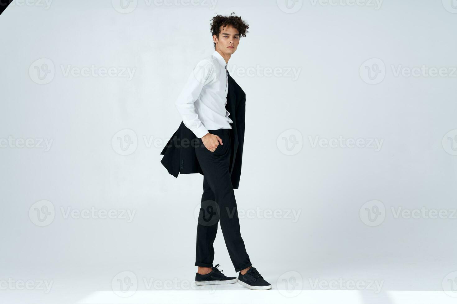 business man jacket shoulder self confidence curly hair photo