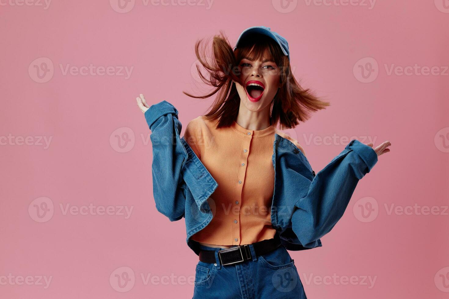 Beauty Fashion woman denim cap red lips glamor fashion color background unaltered photo