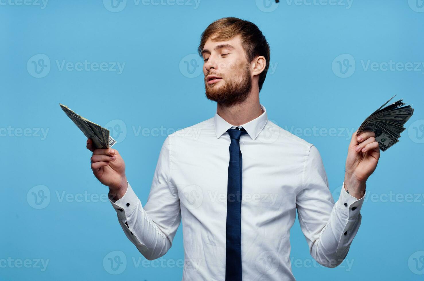 business guy holding money Business man holding money stock photo