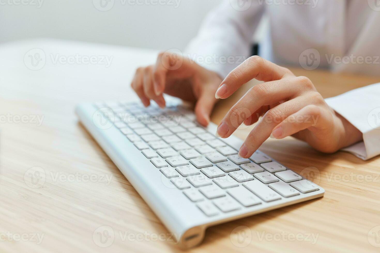 Closeup shot hands of businesswoman journalist office worker freelancer typing report doing documents on keyboard. Online communication, Remote job or Education. Copy space, wide angle photo