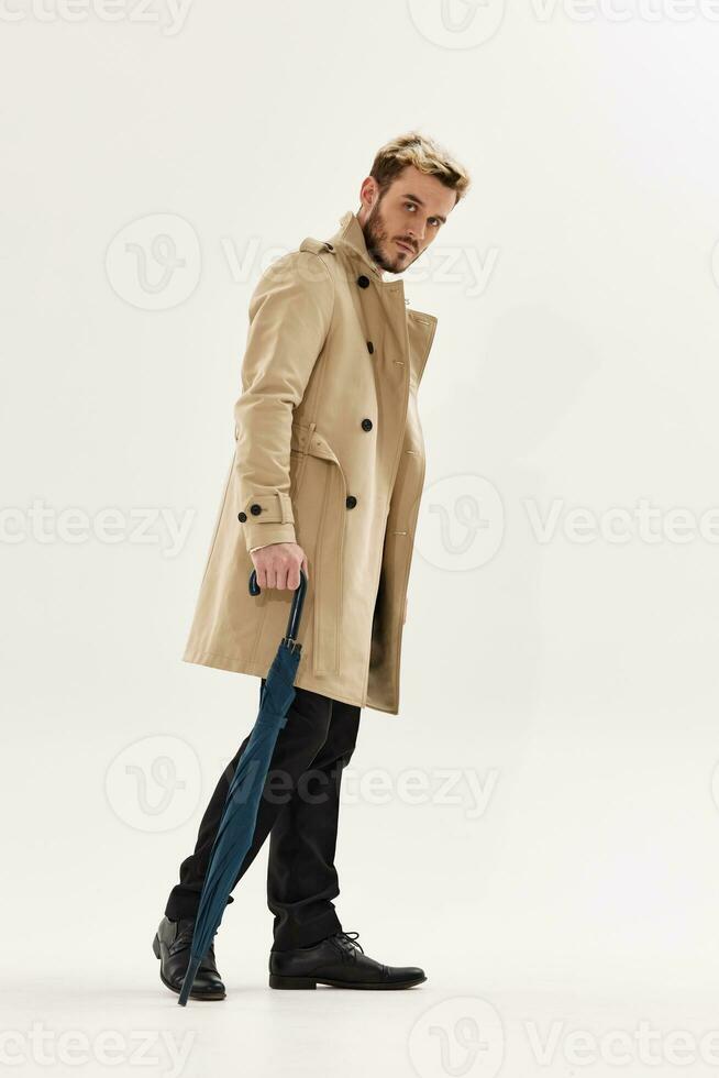 man with umbrella autumn style posing clothing full length photo