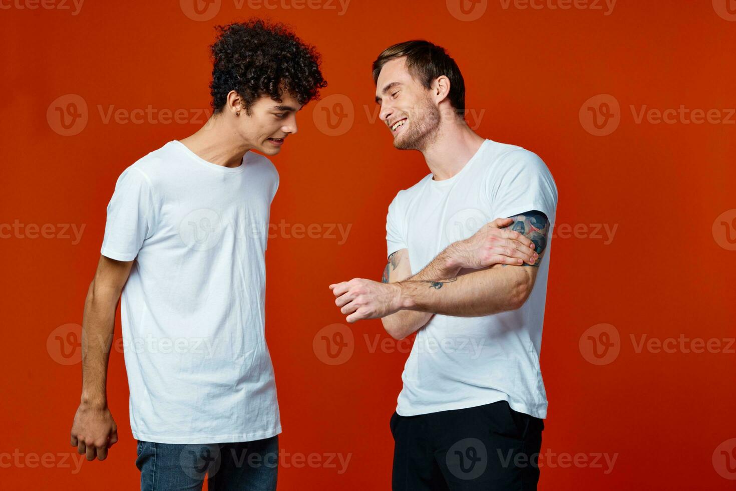 two friends in white t-shirts construction teams he emotions photo