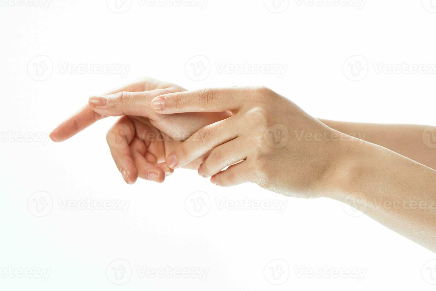 hands cream massage skin care close-up health light background photo